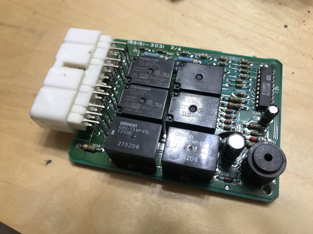 Rear window relay circuit board with new relays installed