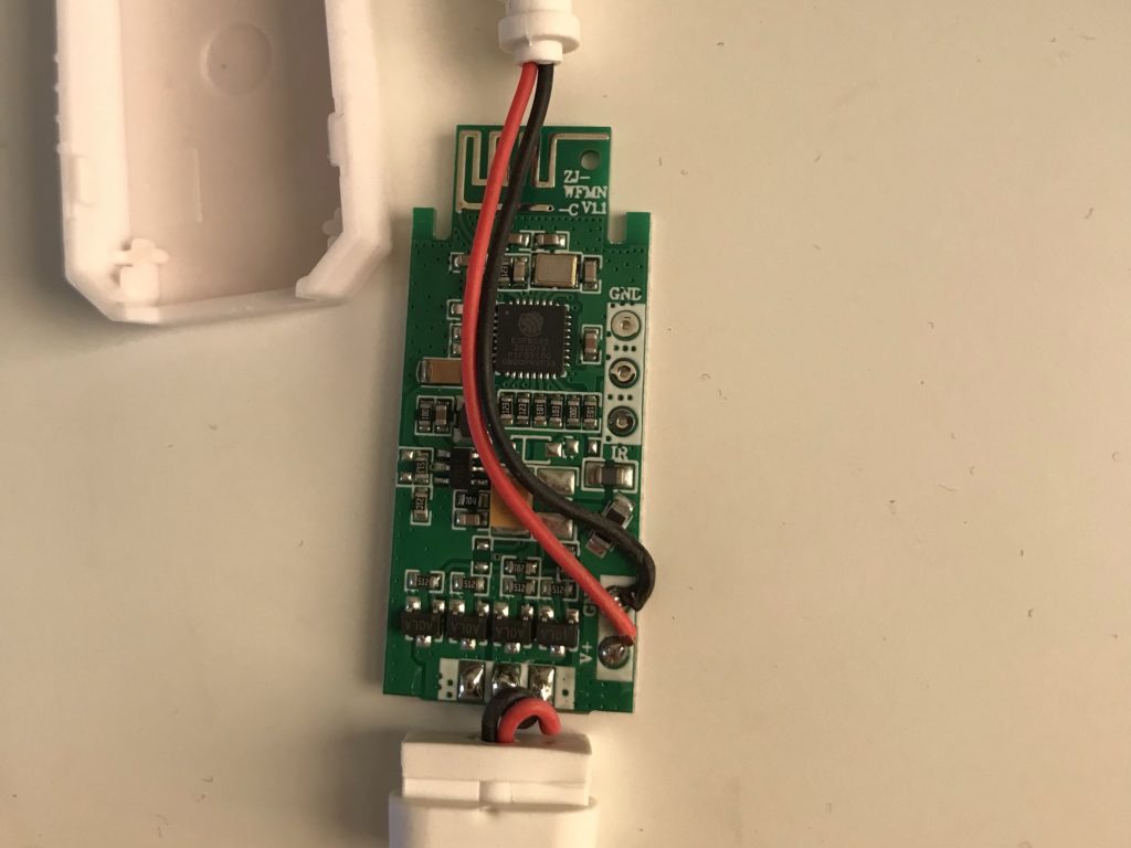 Magic Home WiFi LED controller opened up, showing the ESP8285 chip.