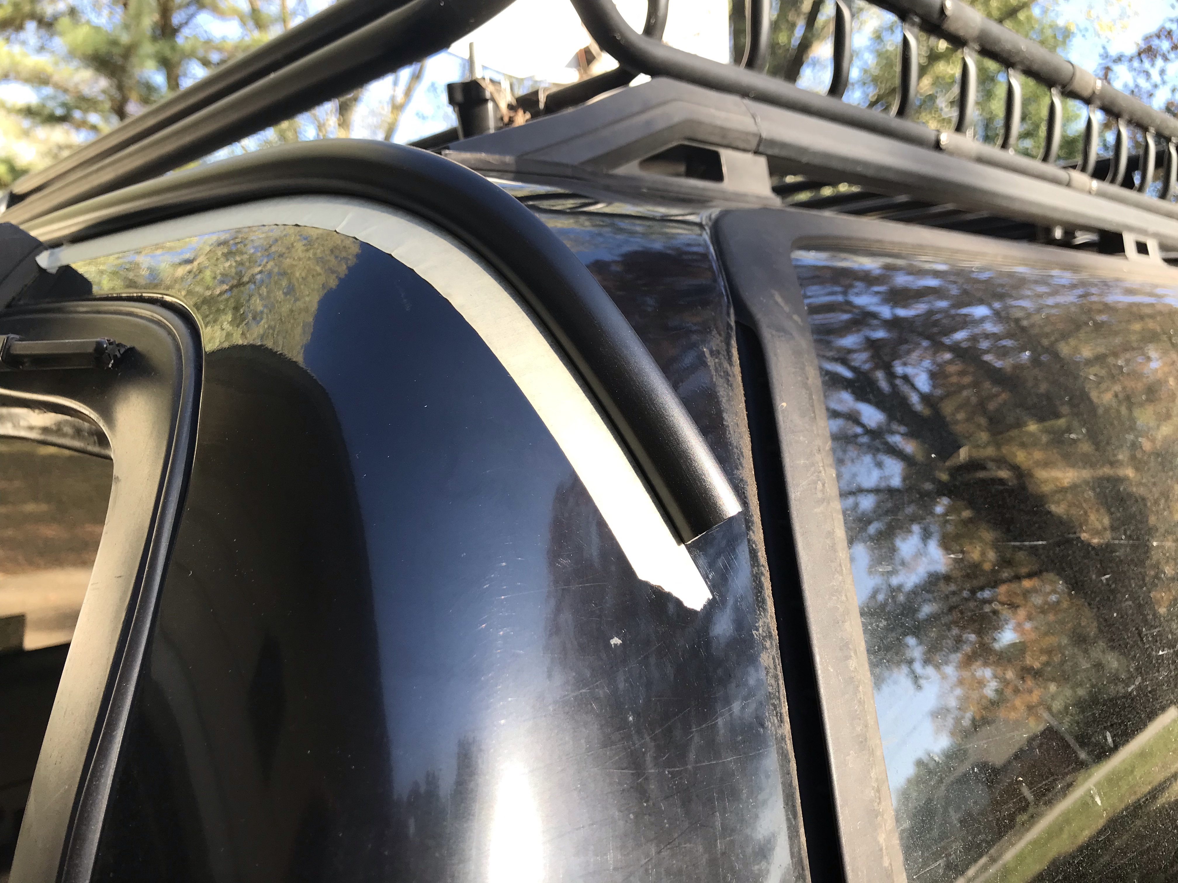 Masking tape as a guide for the rear window drip rail