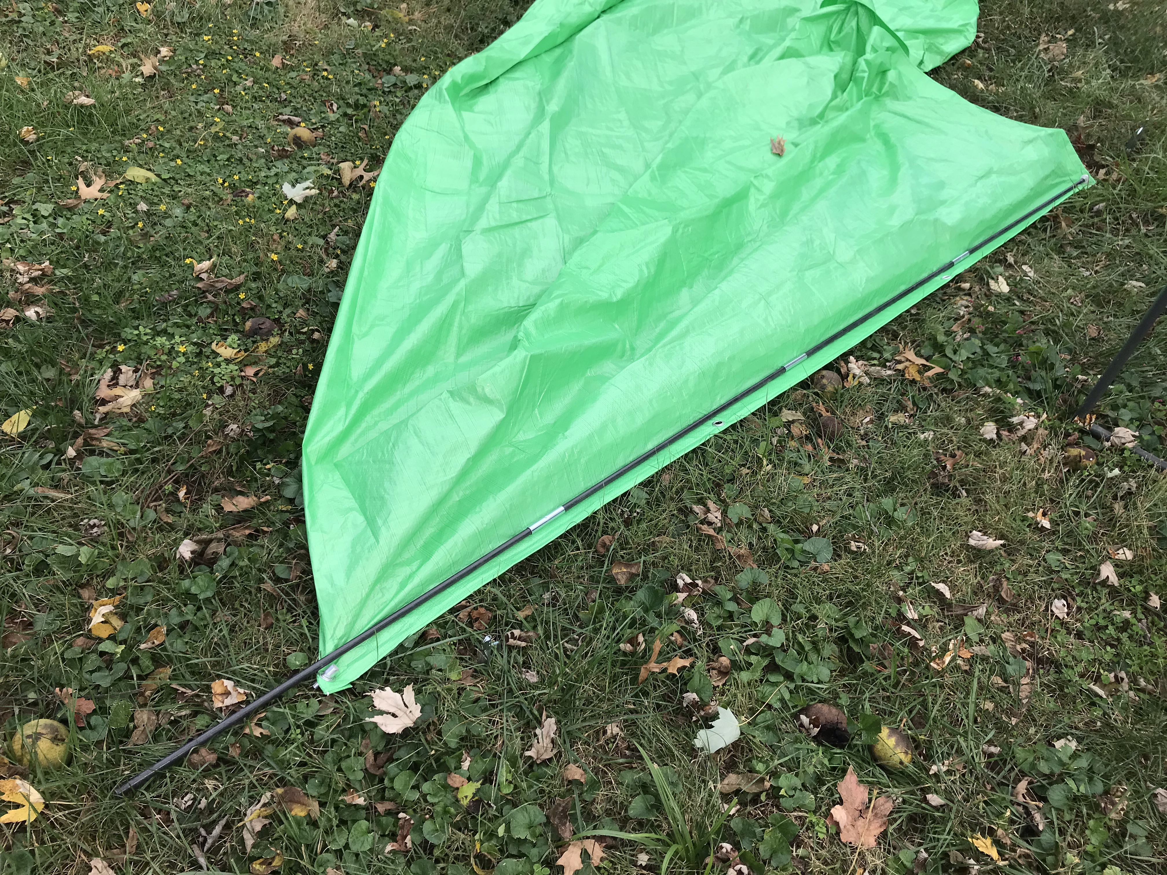 Measuring to cut the fiberglass tent pole