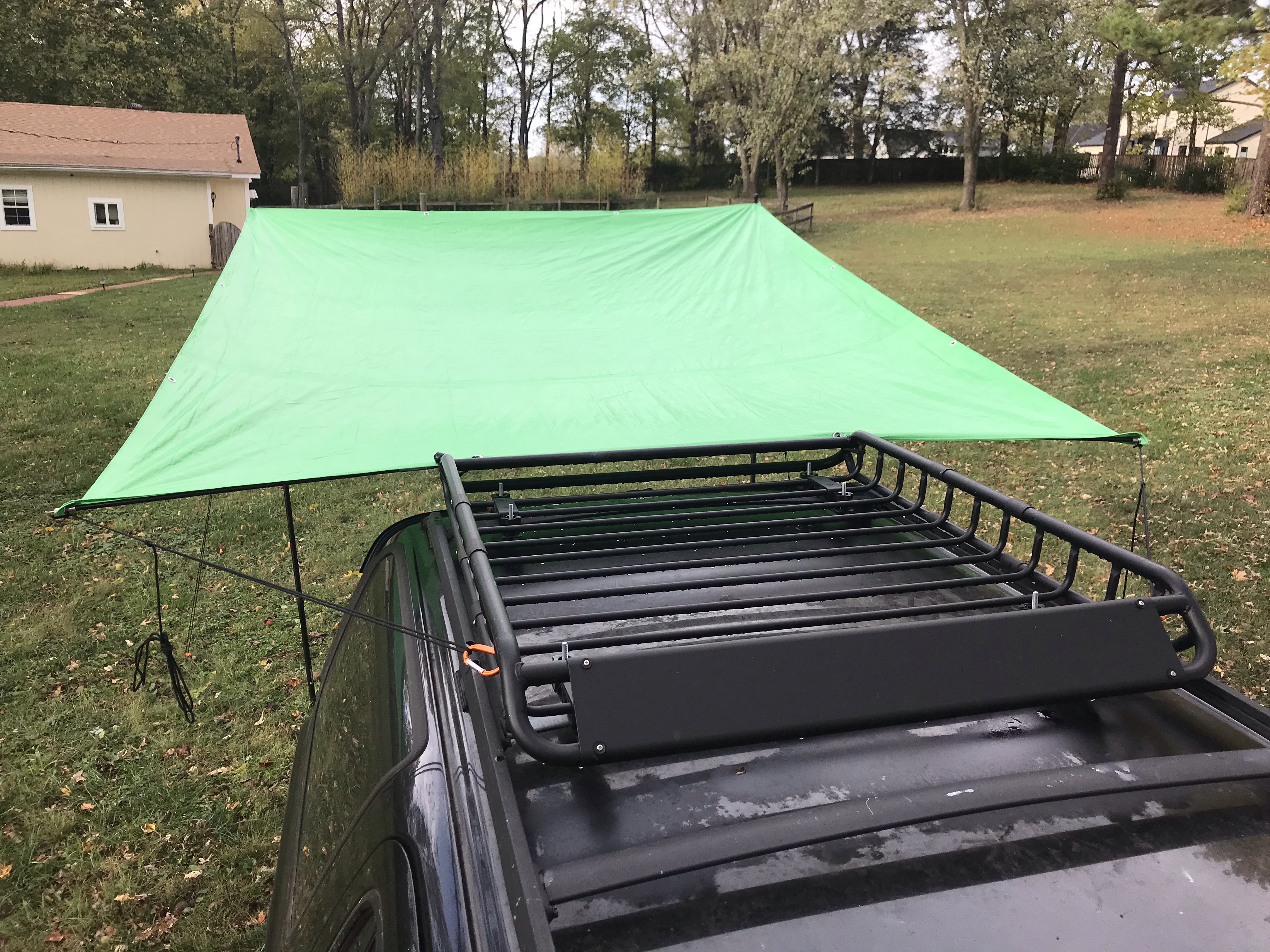 Guy lines attached to the roof rack